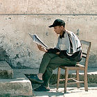 Nepalese man reading a newspaper